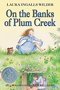 On the Banks of Plum Creek by Laura Ingalls Wilder Book Cover